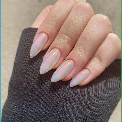 A set of almond-shaped nails with a glossy, iridescent opal finish that reflects pastel hues under the light.